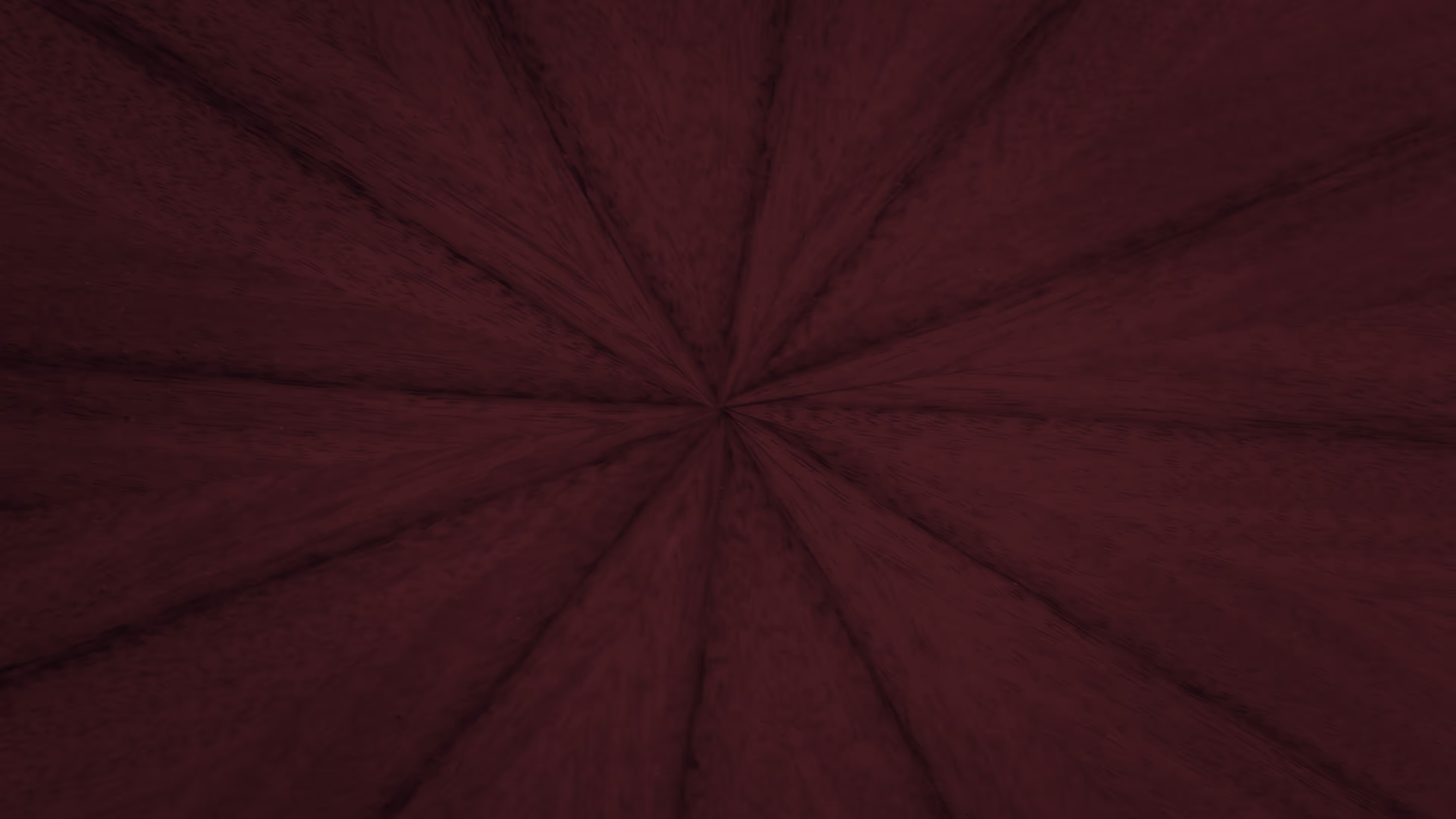 A red circle with a darker red background.
